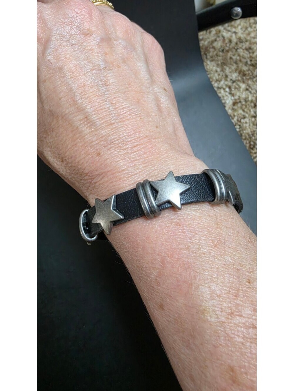 Black Faux Leather Bracelet with Silver Star Accents and Adjustable Buckle